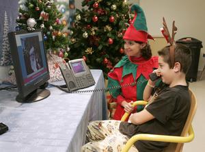 Kids at Children's Hospital of Eastern Ontario connect<br>with Santa in the North Pole using Cisco video technology