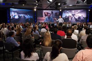 Cisco Chairman and CEO John Chambers talks to employees in San Jose, CA as well as employees assembled via Cisco TelePresence technology in Bedfont Lakes, UK; Amsterdam, NL; Atlanta, GA;  Research Triangle Park, NC; Irvine, CA and Boxborough, MA during Cisco's first ever virtual, global company meeting.