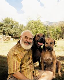 Dr. Andrew Weil's dogs, Jambo and Daisy,<br> help the environment by eating Pet Promise.