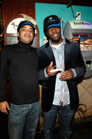 VP of Urban Marketing, Sony BMG, Anthony Ellis, and recording artist Wyclef Jean at the TouchTunes listening party for Wyclef Jean's new release 'Carnival Vol. II: Memoirs of an Immigrant' at Alligator Lounge in Brooklyn, New York.

