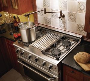 A 'must-have' gourmet kitchen accessory, the ShowHouse by Moen Pot Filler mounts to the wall above cooktops to fill large pots for increased utility, style and safety.