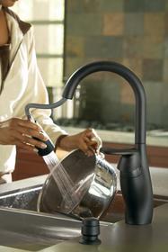 A sleek faucet with a high-arc silhouette and soft modern styling, the Medora multi-function pullout kitchen faucet offers the perfect blend of form and function.