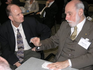 SPIE President Kevin Harding of GE Global Research, left, and Vinton Cerf, Vice President and Chief Internet Evangelist of Google, talk during the recent Engineering R & D Symposium.