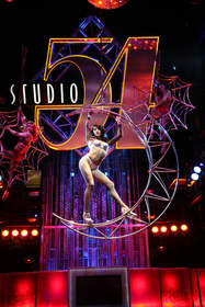 Throughout Studio 54's five-day Nightmare on 54th Street celebration, Sexy Spider Girls entertain the masses as they spin, swoop and swing on the aerial webs and ghost bungees.