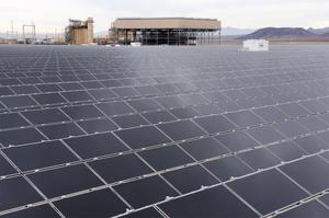 More than 167,000 thin-film, photovoltaic solar panels were installed at the facility.  Sempra Generation's 480-megawatt El Dorado Energy natural gas-fired power plant can be seen in the background. 