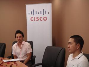 Tep Misa (left) and Jason Villegas (right) in the Cisco Philippines TelePresence Suite