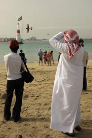 Spectators line the beaches in Abu Dhabi to have an up close and personal view of the Red Bull Air Race on Friday, April 17.