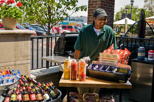 Marcus Desselle, Westborn Market's Grillables Master in Berkley, Michigan, greets guests with a big smile and big taste from Westborn's Summertime Grill which features many local grillable favorites.