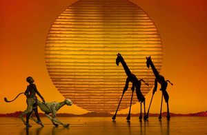 Marija Juliette Abney, Jeremiah Tatum, and Derrick Spear in the opening number The Circle of Life from THE LION KING Las Vegas.  (c)2009, Disney.  Photo Credit:  Joan Marcus.