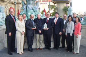 Omron Electronic Components LLC's Management and Distribution Sales Team presented TTI and Mouser Electronics with their 2008 Distributor of the Year Award at the 2009 EDS show in Las Vegas.