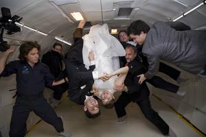 Noah Fulmor and Erin Finnegan flip in float as they say their 'I Do's' in weightlessness with ZERO-G