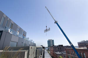 GerrityStone hoists over 2000 pounds of stone up seven floors in downtown Boston