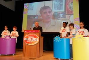 Jon Scieszka, National Ambassador for Young People's Literature, hosts the Scholastic Summer Challenge LIVE kick-off event. 39 Clues author Rick Riordan appears in the background.