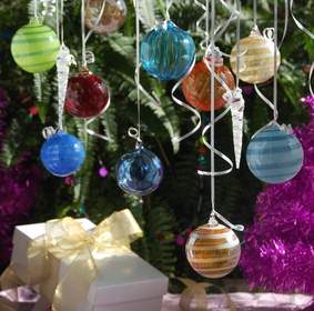 Holiday ornament display at 'Holiday Glass Art & Ornament Extravaganza'