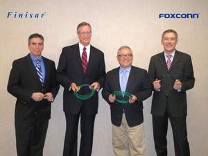 Finisar and Foxconn Sign Laserwire(R) Partnership Agreement on November 12, 2009. 
Left to right: Brian Sill (Foxconn, Sr. Director Strategic Alliance), Jerry Rawls (Finisar, Executive Chairman), Sidney Lu (Foxconn, Corp. Executive VP NWinG), and Jan Meise (Finisar, Director Strategic Marketing). 