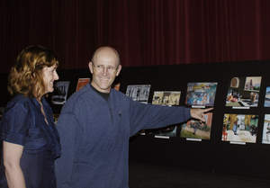Pageant of the Masters Director Diane Challis Davy and Scriptwriter Dan Duling in front of the preview presentation of the 2010 Pageant of the Masters, "Eat, Drink  & Be Merry."