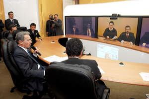 President Alvaro Uribe during the first TelePresence meeting
