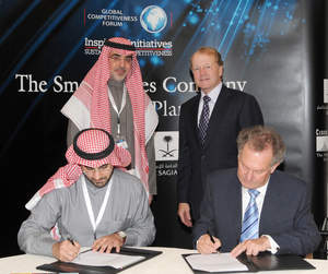 Signing the contract on the left is the Chief Technology Officer of SAGIA, Dr. Ahmad Yamani  and Cisco's Executive Vice President, Cisco Services & Chief Globalization Officer  Wim Elfrink. Standing to the left is the Governor of SAGIA H.E Amr Dabbagh and on the right John Chambers Cisco's Chairman and Chief Executive Officer
