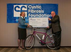 Ruth Thieroff-Ekerdt, M.D., Chief Medical Officer at Eurand Pharmaceuticals, presents a check for $300,000 to Robert J. Beall, Ph.D., President and CEO of the Cystic Fibrosis Foundation,
for Eurand's national title sponsorship of the inaugural 2010 ZENPEP(R) CF Cycle for Life. The 18-city series of cycling tours, which kicks off June 26th in San Francisco, will help raise money for vital cystic fibrosis programs and research.
