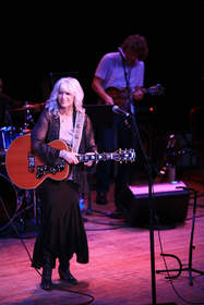 Emmylou Harris plays with Sam Bush and an unprecedented group of artists for NRDC's 'Music Saves Mountains' Concert at The Ryman in Nashville, TN.