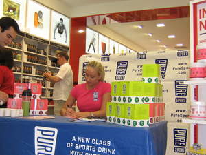 Olympic Gold Medal-winning gymnast Nastia Liukin signs autographs at GNC's SouthPark Mall while promoting sports nutrition products from PureSport(TM). 