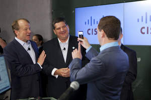 John T. Chambers, chairman and chief executive officer, Jim Grubb, Chief Demonstration Officer