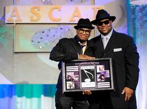 Songwriter of the Year Ne-Yo accepting his award from Jimmy Jam at the 23rd annual ASCAP Rhythm & Soul Music Awards