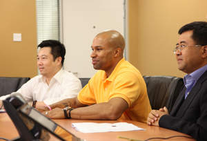 Derek Fisher addresses the regional press from the Cisco TelePresence Suite in the Cisco Pavilion at World Expo in Shanghai.