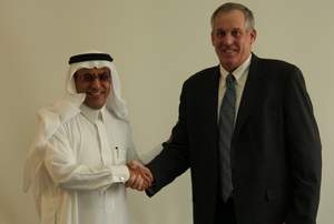 Khaled AlKaf, CEO, Mobily, Saudi Arabia (left) and Wayne Fullerton, managing director for Cisco in Saudi Arabia (right) shake hands to mark Cisco's support for Mobily in launching Managed Services in Saudi Arabia 
