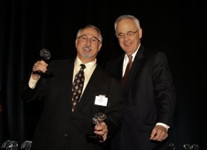 MSI's CFO, Ron Warren receives awards from HBJ's John Beddow