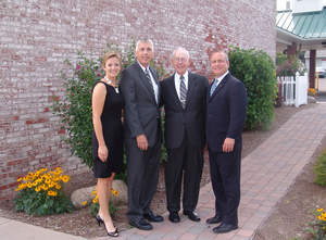 Pathfinder Bank has formed a strategic partnership with Oswego-based insurance group, FitzGibbons Agency. Shown pictured at the Pathfinder 44 Business Center in Oswego and representing Fitzgibbons Agency are from left to right: Tara FitzGibbons, business manager; John FitzGibbons, owner; and Jack FitzGibbons, owner. Representing Pathfinder Bank is Tom Schneider, president and CEO.
