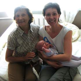 Tatyana visiting her new grandson and daughter while supported by SynCardia's Total Artificial Heart and Freedom(R) portable driver