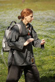 Total Artificial Heart patient Margaret Daugherty practices Tai Chi wearing her Freedom(R) portable driver in the Backpack in a nearby park. She is currently living at the Hospitality House near VCU Medical Center while she waits for a matching donor heart.