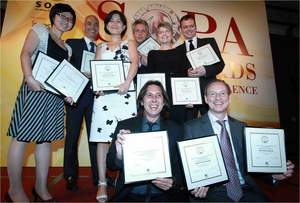 Celebrating the Post's wins are (back row from left to right) social media editor Yolanda Ma; acting editor-in-chief Cliff Buddle; China editor Ting Shi; photo editor Yves Sieur; senior editor S. K. Witcher; senior art director Troy Dunkley; (front row left and right) and head of graphics Stephen Case; opinion page editor Robert Haddow