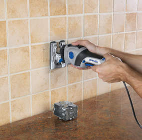 The Dremel Trio's ability to cut, sand and rout make it an ideal tool to use while cutting tile to install a back splash.