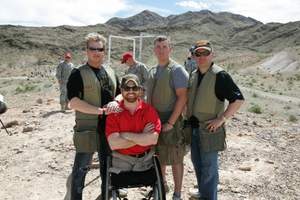 Gary LeVox of Rascal Flatts, Wounded Warrior Project board member Andrew Kinnard, Congressional Medal of Honor nominee Dakota Meyer and Starkey President Jerry Ruzicka - the winning team at the NRA Country/ACM Celebrity Shoot