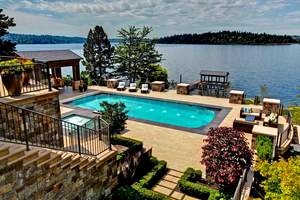 The home has a three-level terrace that overlooks its 164 feet of frontage on Lake Washington. 