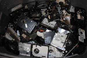 As part of its asset management recycling, XTechnology Global responsibly recycles hard drives as these shown at its Danvers, MA headquarters. 

