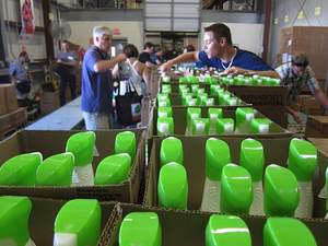 Seventh Generation volunteers descended on Vermont Foodbank's warehouse in Barre, Vermont yesterday to assemble 1,200 'green' cleaning kits filled with the natural and non-toxic clean-up supplies residents need to safely start putting their homes and lives back together.