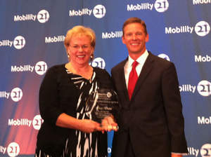 Mobility 21's Private Sector Leader of the Year Award winner Lucy Dunn, CEO and president of the Orange County Business Council and California Transportation Commissioner and Eddie Northen of UPS and chairman of the Orange County Business Council. 