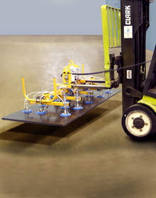 The Anver Fork Lift Vacuum Attachment picks  up loads  from the top