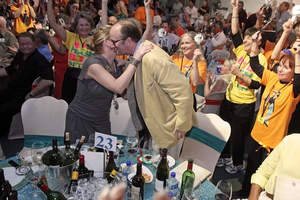 HRH Prince Robert of Luxembourg and the winning bidder celebrate the record-setting bid on his donated wine lot at the 2012 Naples Winter Wine Festival, the world's most successful charity wine auction. Photo credit Tom Harper