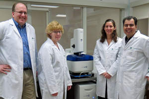 (left to right) - John Ireland of NanoProfessor next to Karen Linzmeier, Lisa Del Muro and Frank Caballero, who are all science teachers at Wheeling High School that attended a NanoCamp at NanoProfessor's facilities to learn more about nanotechnology education.