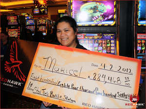 Red Hawk Casino, in Placerville, Calif., pays out $884,468 slot jackpot, Monday, April 2, 2012.