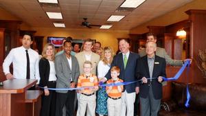 Official ribbon cutting of Roosters Men's Grooming Center at Turkey Creek