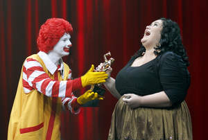 Voice of McDonald's winner Chrislyn Hamilton from Brisbane, Australia, receives her award on stage after she is crowned champion of the competition. Hamilton's prize package includes: $25,000, a voice over in an upcoming DreamWorks animated film, appearance in a McDonald's TV commercial, and a trip to the American Idol finals.