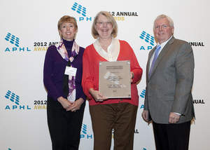Mary Sue Kitchener, MT(ASCP), director, Fairfax County Health Department Laboratory is receiving the award on behalf of her lab. She is accompanied by representatives of HDR, the international architectural design firm that sponsors the award.