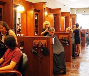 Patrons of Roosters Men's Grooming Center in Greenville, South Carolina receive services from master hair care specialists.