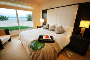 A guest room at Wyndham Grand Playa Blanca