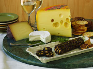 Cheese plate with Fig and Toasted Nut Roll